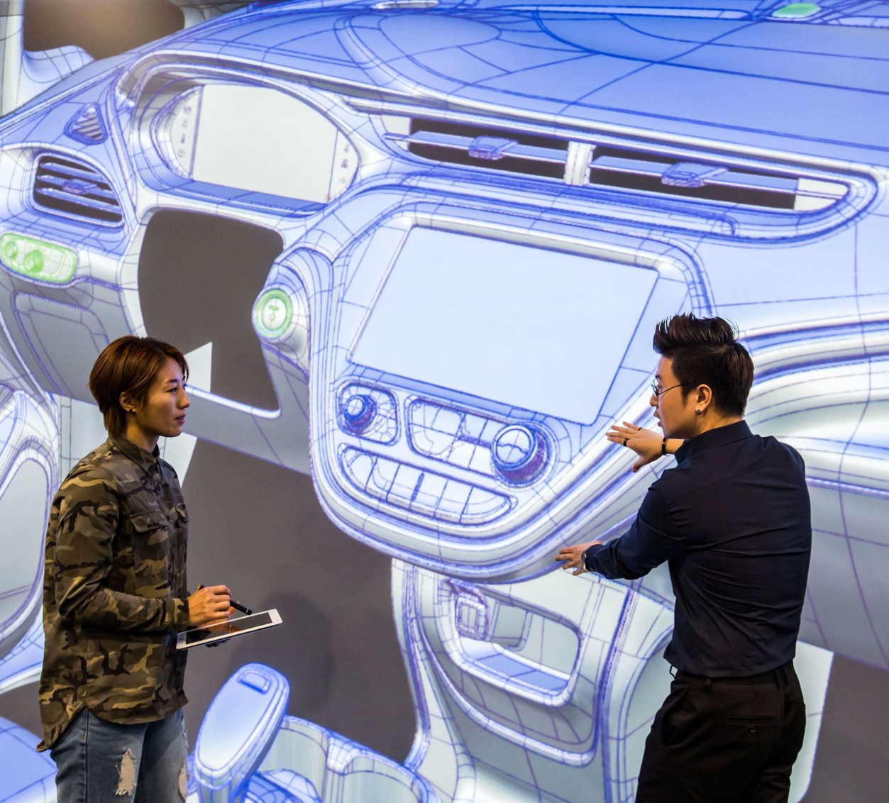 Designers looking at image