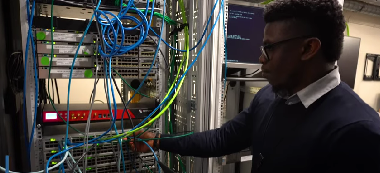 GM Employee working on server