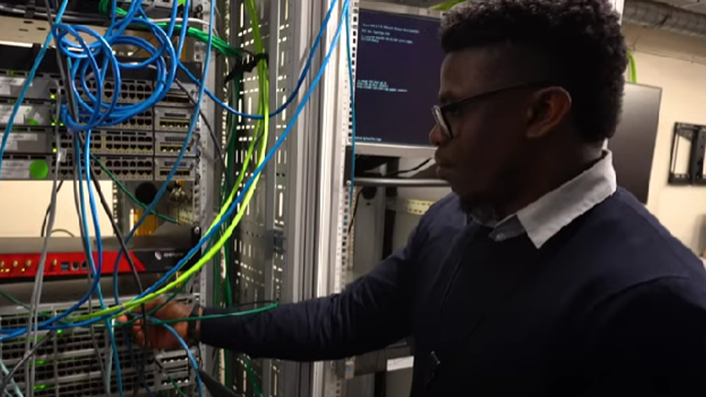 GM Employee working on server