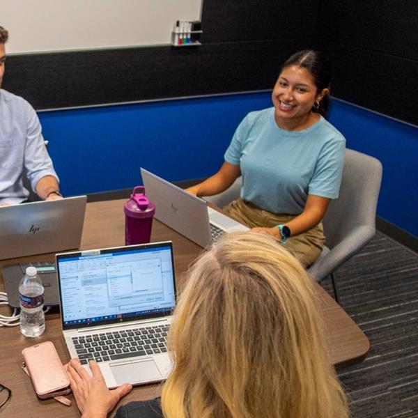 GM engineers collaborate in conference room